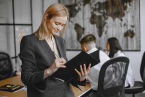A business woman looking at files